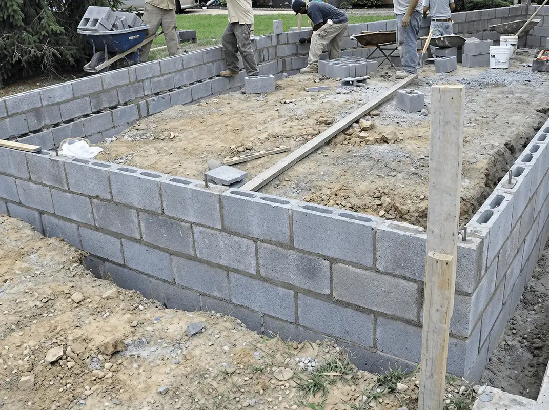 Professionals building a foundation with blocks in Albuquerque, NM