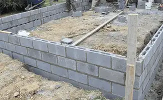 Professionals building a foundation with blocks in Albuquerque, NM