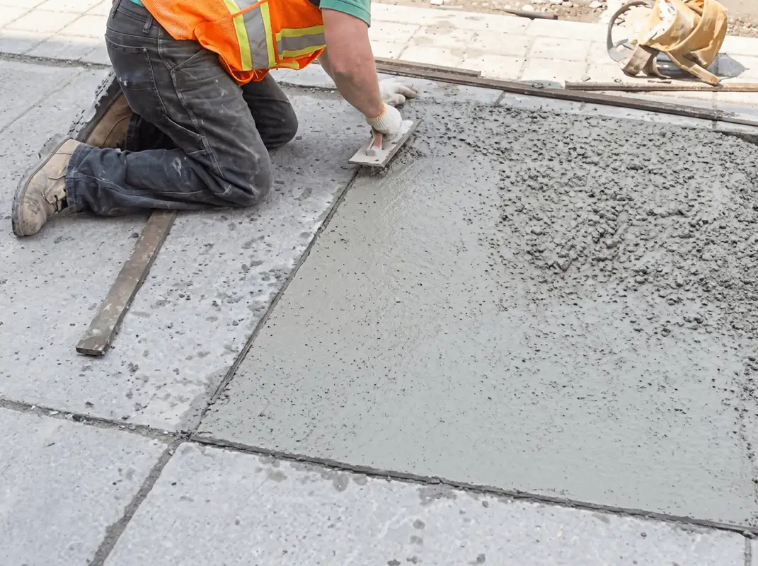 Professional repairing a concrete floor in Albuquerque, NM